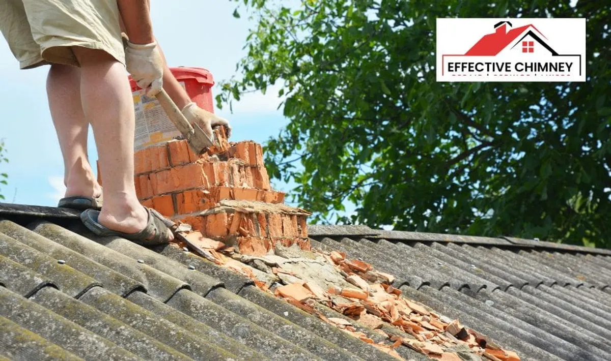 Brickwork being removed around a chimney