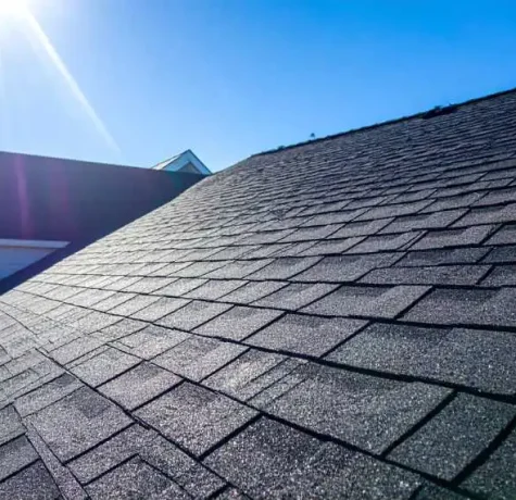 Inspector reviewing roofing compliance documents in New Jersey.