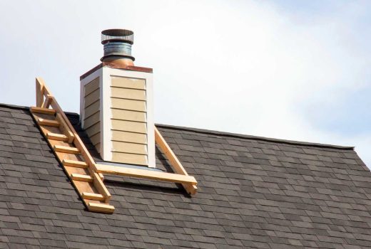 Close-up view of chimney flashing installed to prevent roof leaks.