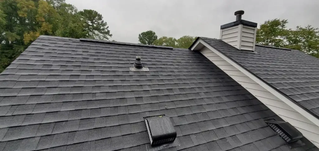 Roof shingle repair on a residential home in New Jersey by Effective Roof contractors after storm damage.